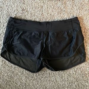 Lululemon black Speed Up Low Rise Short in black mesh size 10